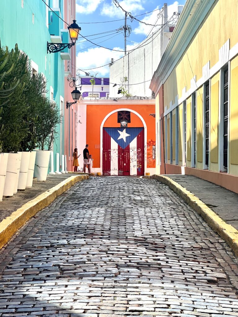 Vibrant street of Old San Juan Puerto Rican flag